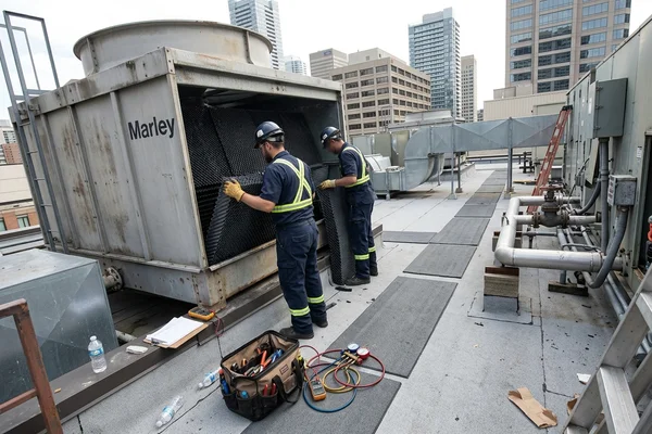 Installing new fill media in a cooling tower